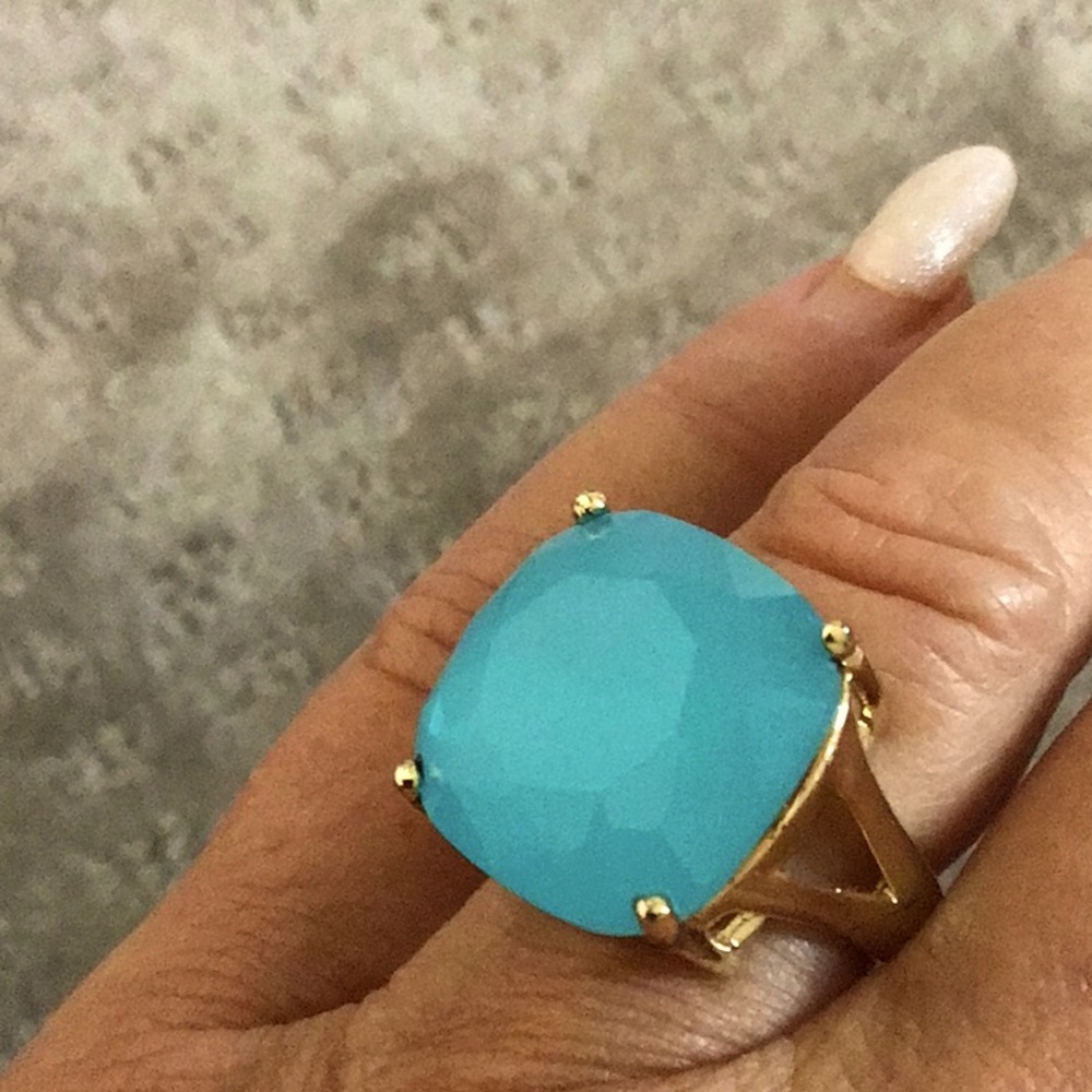 Prong set faceted glass turquoise ring